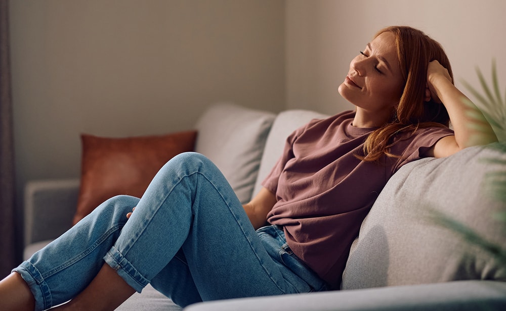 Woman sitting on a couch
